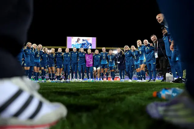 Sweden players and staff gather round for a huddle at the end of the game
