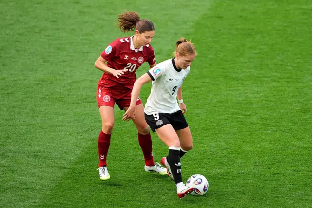 Sjoeke Nuesken of Germany is challenged by Signe Bruun
