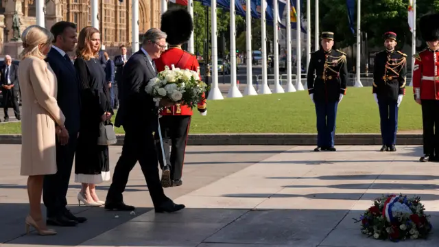 Britain's Prime Minister Keir Starmer walks to lay a wreath at the foot of a statue of Winston Churchill, in Parliament Square, central London on July 8, 2025, on the first day of a three-day state visit to Britain.
