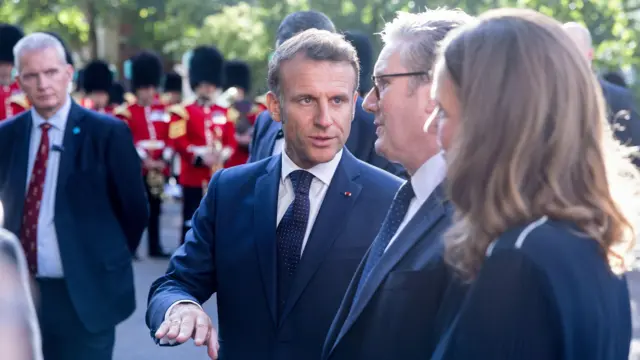 Macron and Starmer speak at a wreath laying ceremony