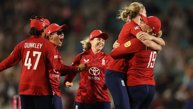England players celebrate victory during the 3rd T20 match