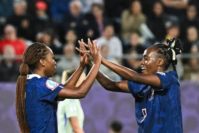 Grace Geyoro celebrate after scoring the fourth goal of the match with France's forward #09 Melvine Malard d