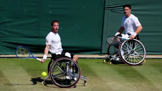 Alfie Hewett and Gordon Reid in wheelchair doubles action at Wimbledon