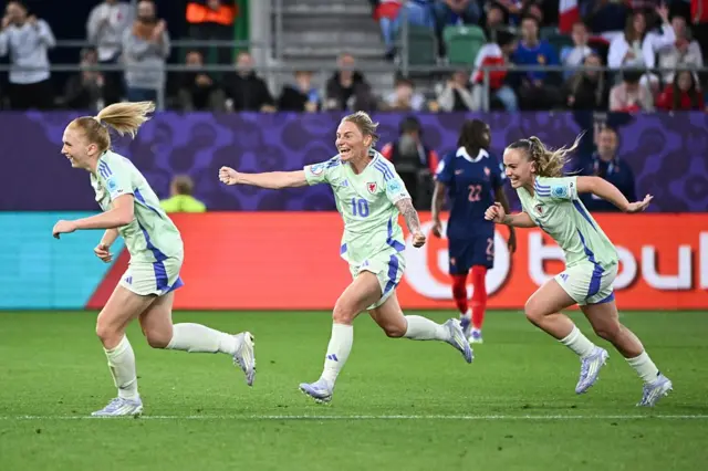 Jess Fishlock of Wales celebrates scoring her team's first goal after the VAR reviewed the on-field decision to disallow the goal before overturning and awarding the goal during the UEFA Womens EURO 2025 Group D match between France and Wales at Arena St. Gallen on July 09, 2025 in St Gallen, Switzerland. (Photo by Alex Caparros - UEFA/UEFA via Getty Images)