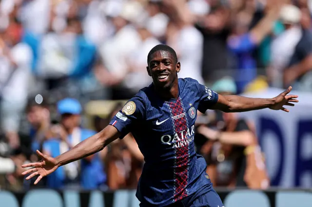 Ousmane Dembele celebrates after scoring for PSG