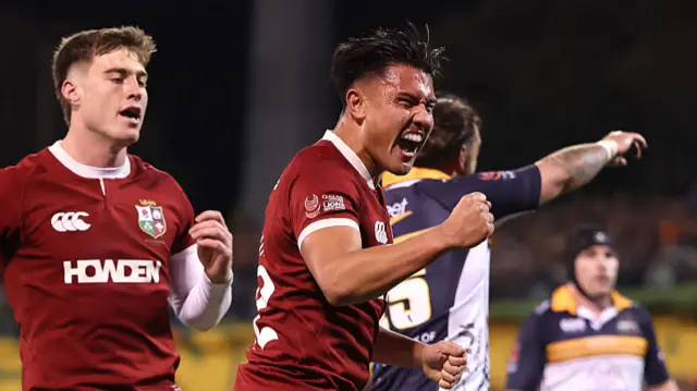 Marcus Smith celebrates his try