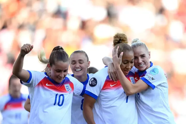 England players celebrate Lauren James' goal