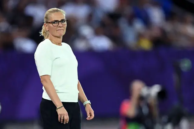 Sarina Wiegman looking on