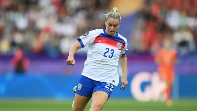 Alessia Russo of England runs with the ball
