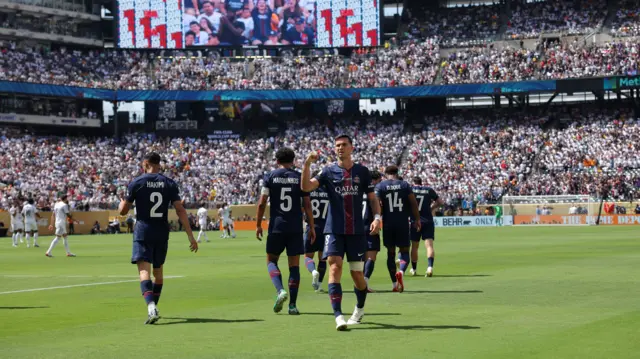 Fabian Ruiz celebrates after scoring his second and PSG's third.