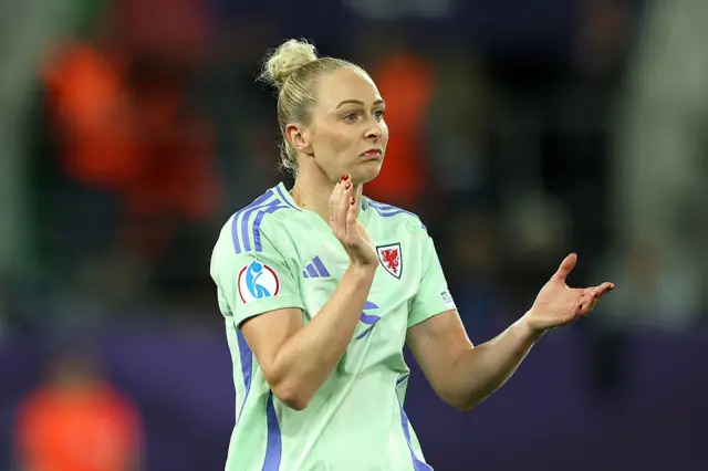 Wales' Rhiannon Roberts applauds