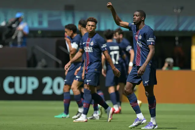 Ousmane Dembele celebrates after scoring for PSG