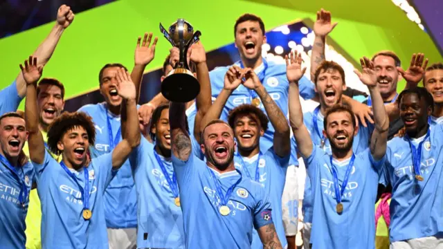 Kyle Walker of Manchester City lifts the FIFA Club World Cup trophy after their team's victory in the FIFA Club World Cup Saudi Arabia 2023