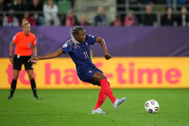 France's Kadidiatou Diani scores