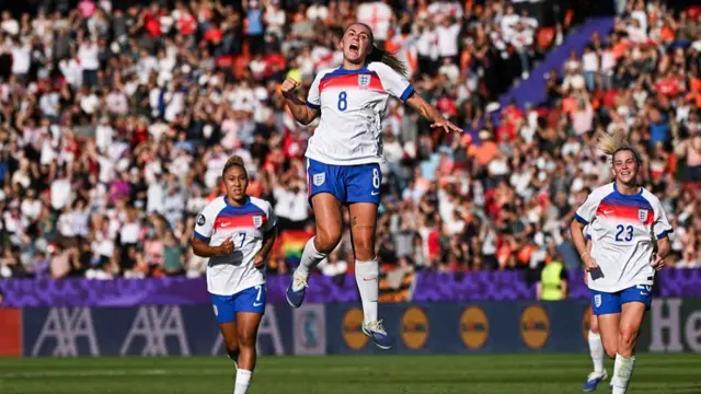 England's midfielder #08 Georgia Stanway celebrates after scoring the second goal