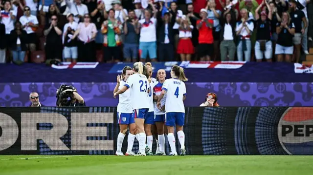 England players celebrate the first goal