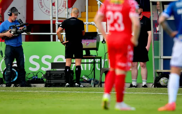 The referee at his VAR monitor