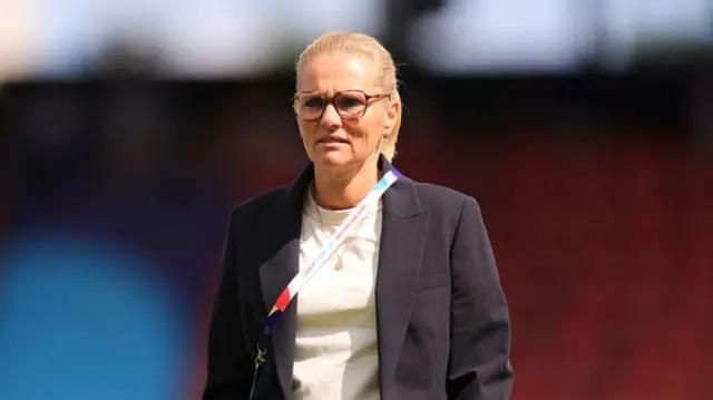 Sarina Wiegman, Head Coach of England, inspects the pitch