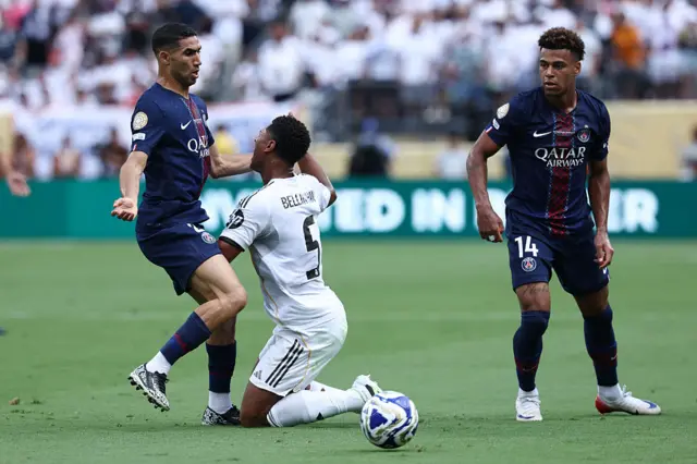 Achraf Hakimi in action with Jude Bellingham