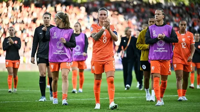 Netherlands players acknowledge their fans after loosing 4-0 to England