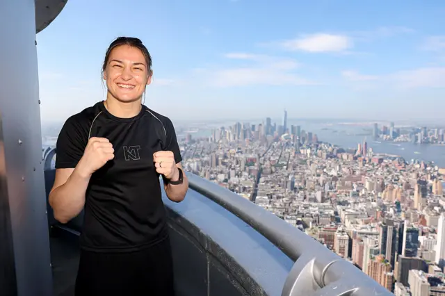 Katie Taylor smiling at the top of the Empire State Building