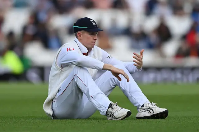 Zak Crawley of England checks his hand after dropping a sharp chance off Sai Sudharsan of India during Day Two of the 5th Rothesay Test Match between England and India at The Kia Oval on August 01, 2025 in London, England.