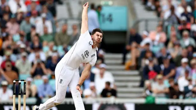 Josh Tongue bowls v India