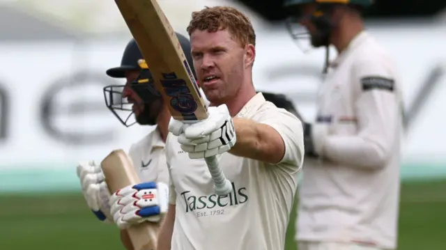 Ben Compton celebrates scoring 200