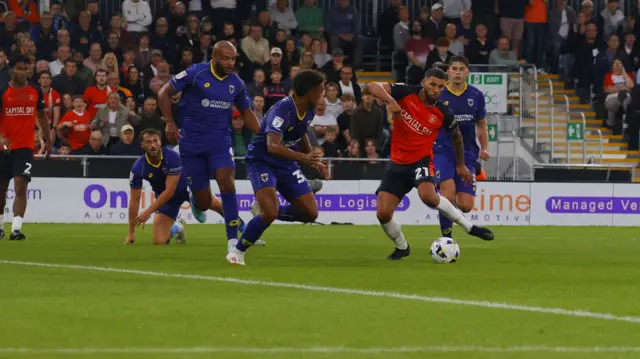 Nahki Wells in action for Luton Town against AFC Wimbledon