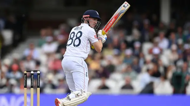 Harry Brook looks on after batting v India.