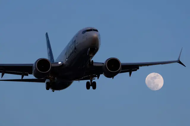 An Alaska Airlines Boeing 737 MAX 8 airplane approaches San Diego International Airport