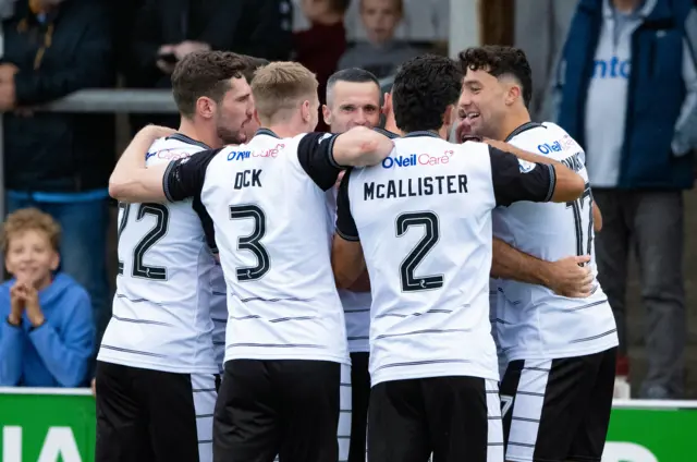 The Ayr United team celebrate after Jamie Murphy scores to make it 1-0