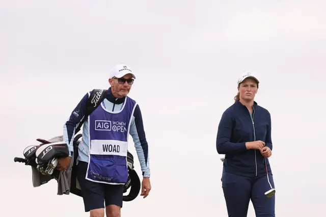 Lottie Woad and her caddie