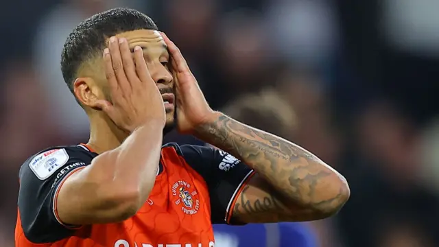 Nahki Wells with his head in his hands
