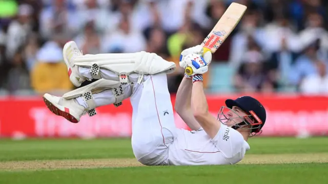 Harry Brook ends up flat on his back after sweeping for six.