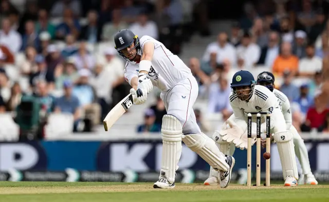 Jamie Smith plays a shot