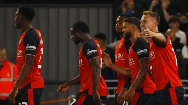 Luton Town celebrate against AFC Wimbledon