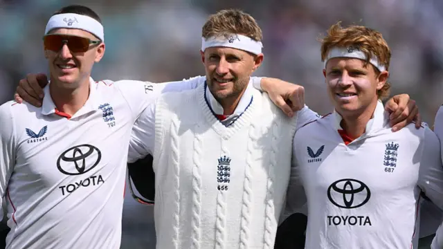 Brook Root and Pope on the field ahead of playing against India - wearing headbands in memory of Graham Thorpe.