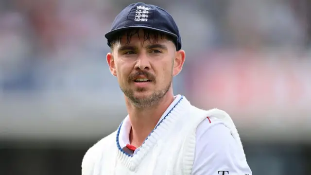 Josh Tongue looks on during the test against India