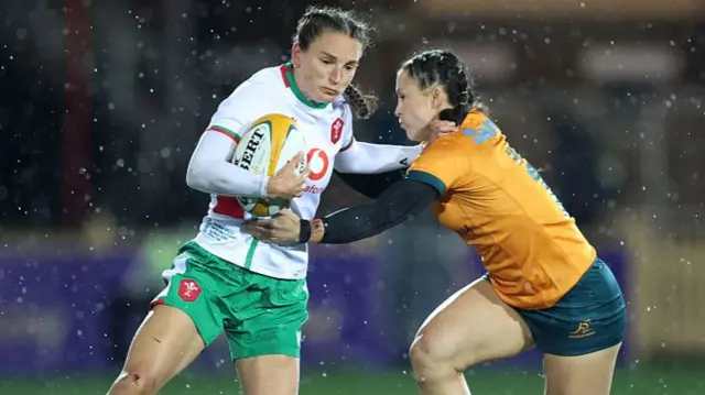 Jaz Joyce carries the ball against Australia