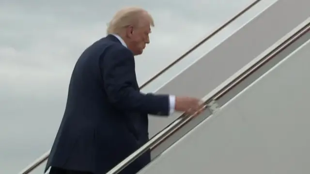 Donald Trump boards air force one