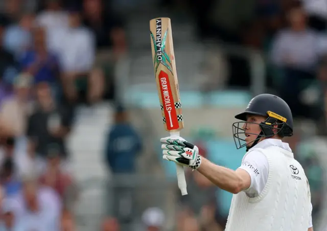England's Zak Crawley celebrates after reaching his half century.