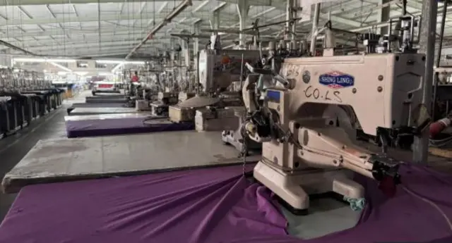 A sewing machine at an empty factory in Lesotho