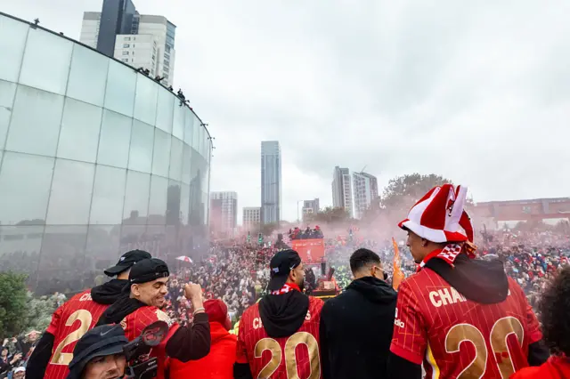 General view of Liverpool as the team bus passes through fans in celebration