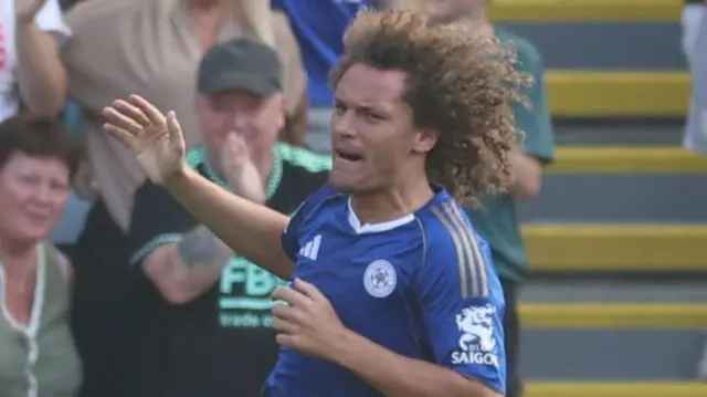 Wout Faes celebrates scoring