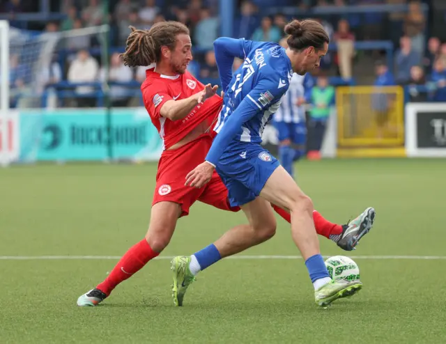 Jamie Glacken on the ball