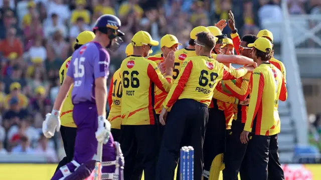 Akeal Hosein of Trent Rockets celebrates with team mates after taking the wicket of Zak Crawley of Northern Superchargers