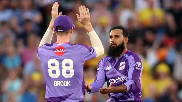 Adil Rashid and Harry Brook