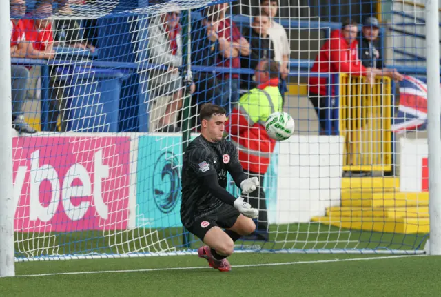 Rohan Ferguson makes a save