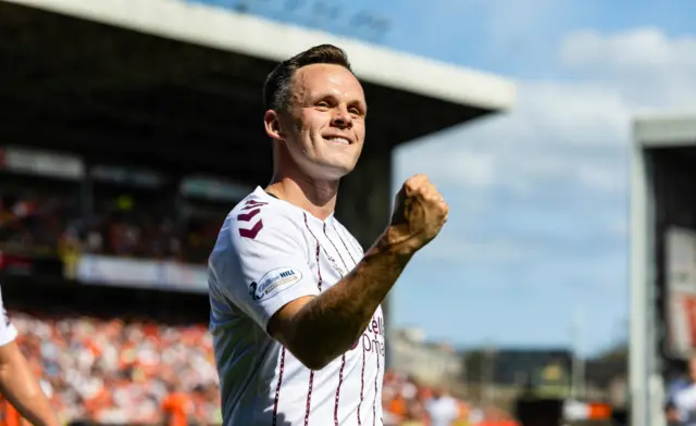 Hearts' Lawrence Shankland celebrates after scoring from the penalty spot to make it 1-0 during a William Hill Premiership match between Dundee United and Heart of Midlothian at the CalForth Construction Arena at Tannadice Park